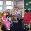 The children listened attentively as Gena King read them a story or two.