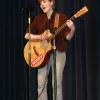 Jasmyn Shaw performed an original song with guitar accompaniment and won 1st place in the College category for her talent.